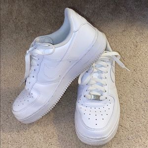 white nike air force 1’s